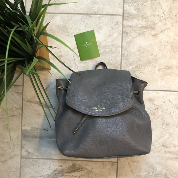 kate spade Handbags - KATE SPADE 100% leather gray backpack